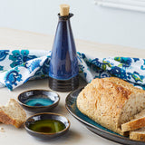 Deep Blue Ceramic Oil Cruet, matching dipping bowls, platter and Sea Flower Table Runner sold separately.